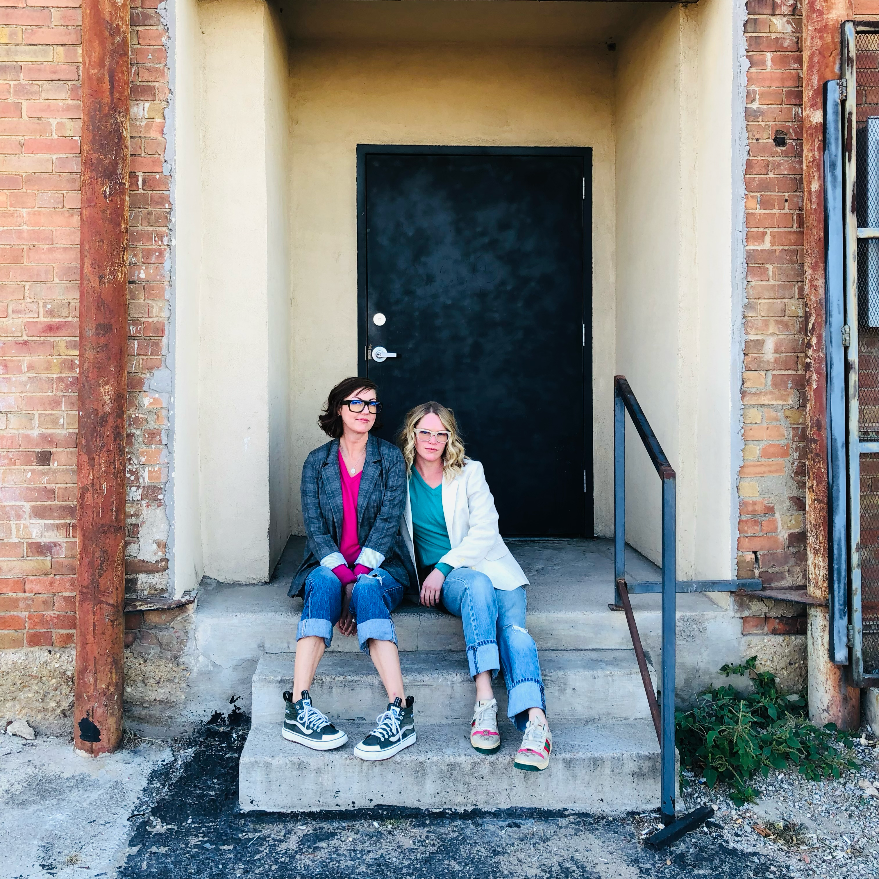 Jo and friend on steps